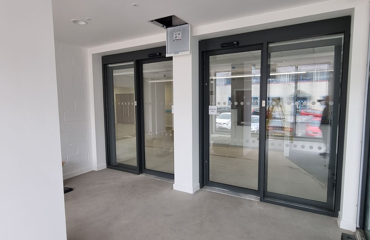 Twin pairs of automatic sliding doors at healthcare reception